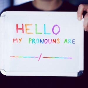 Hello my pronouns are blank and blank on a whiteboard